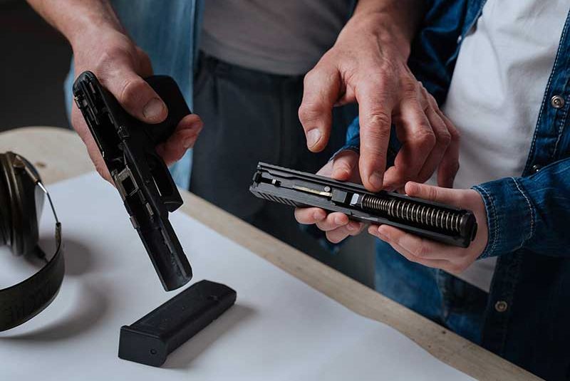disassembling pistol firearm