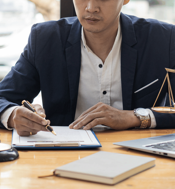 male lawyer working on legal documents